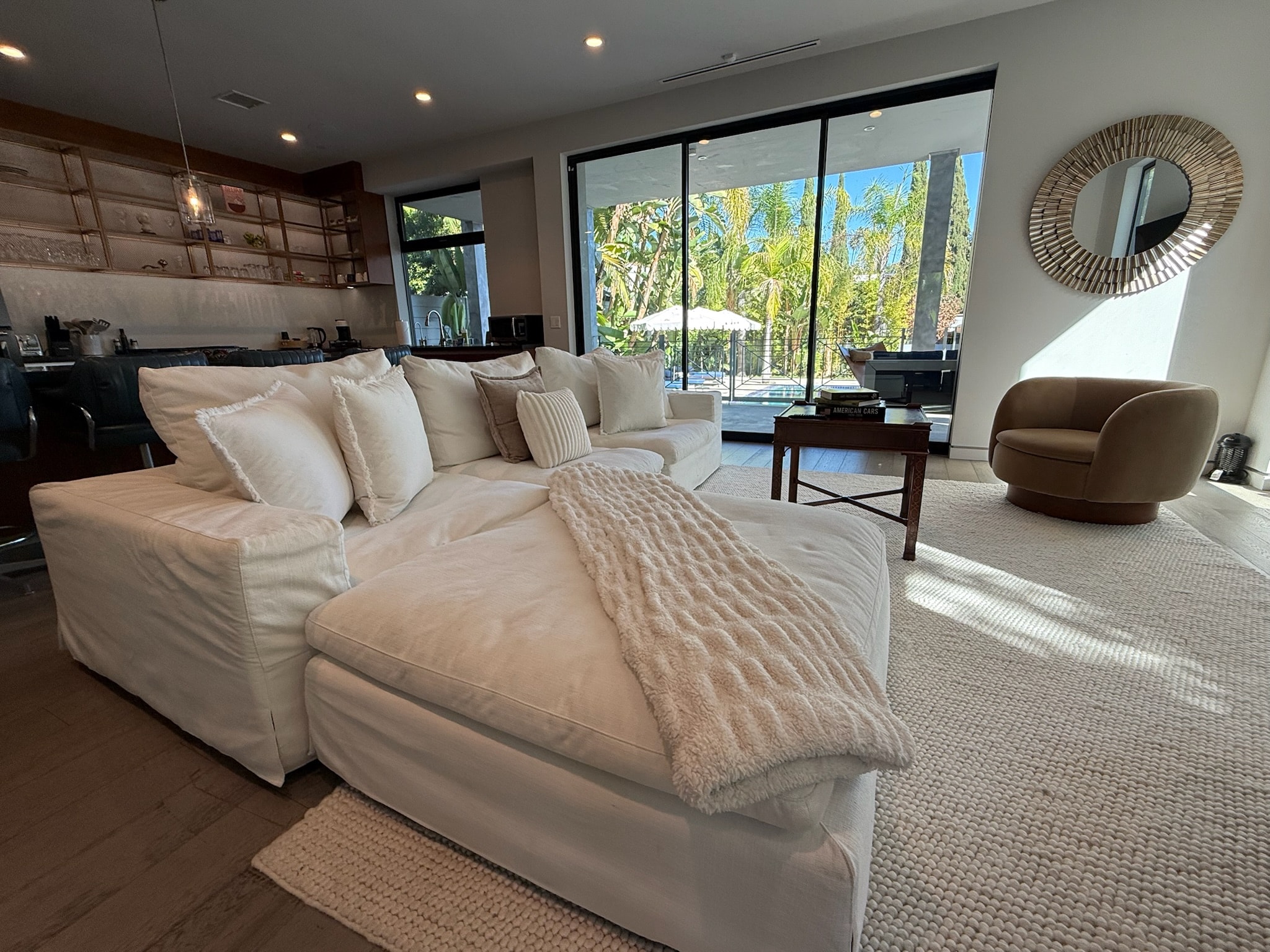 Modern living room with cream sofa and patio