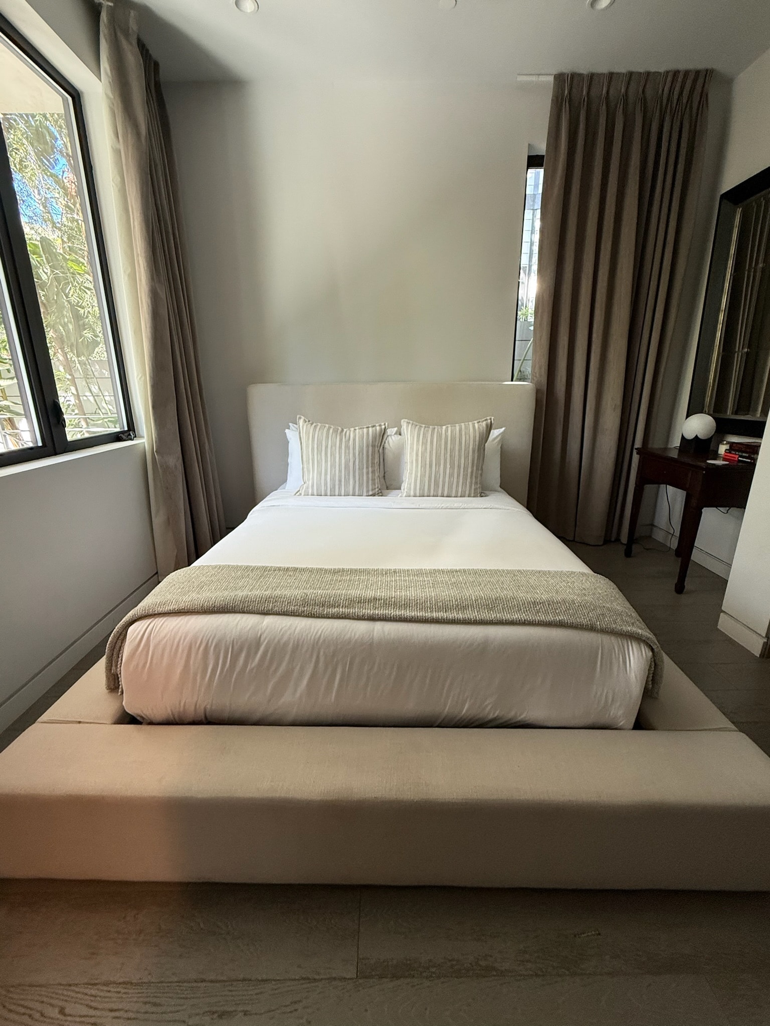 Modern minimalist bedroom with neutral tones