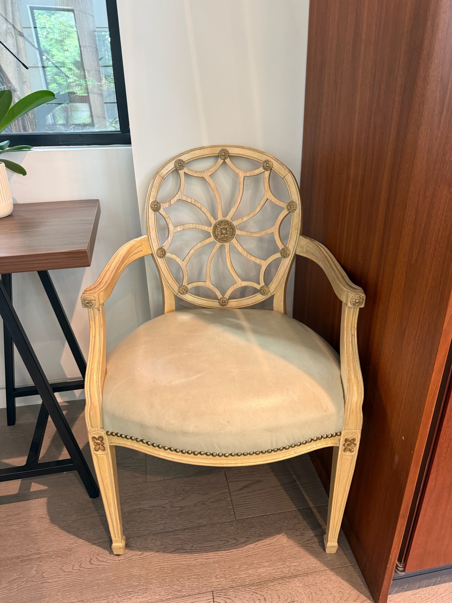Ornate wooden chair geometric backrest