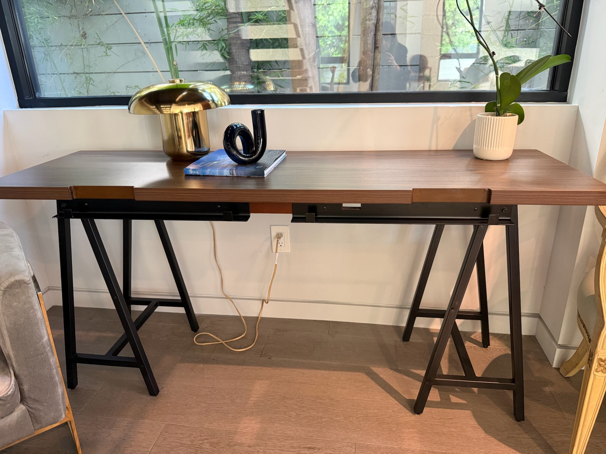 Modern desk with decorative accessories window