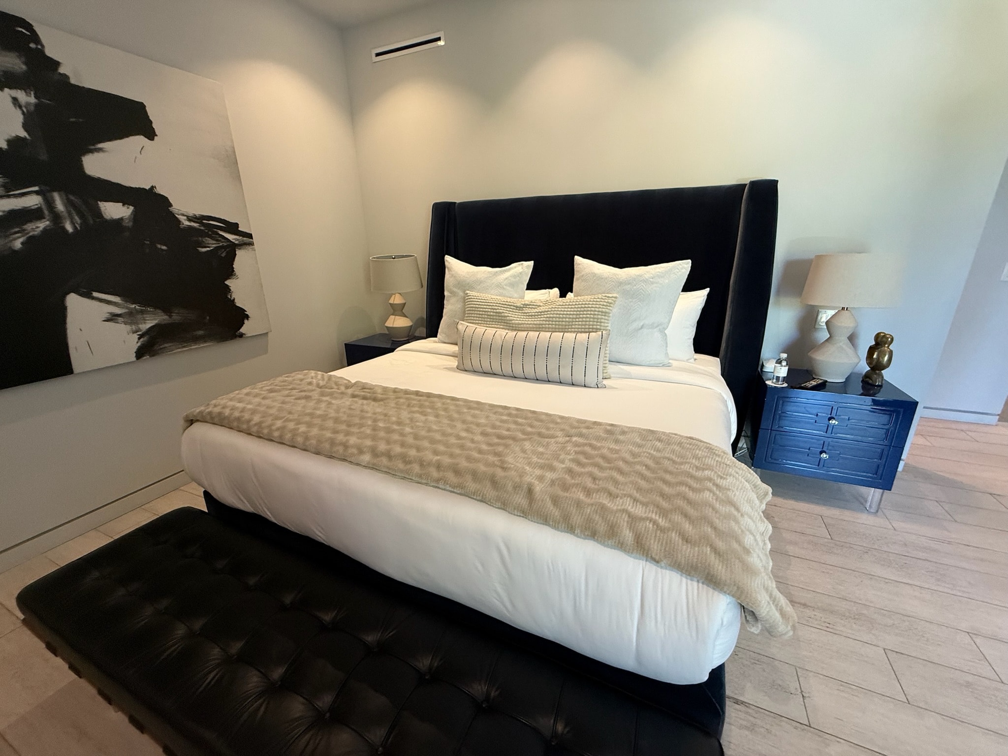 Modern bedroom with black upholstered bed