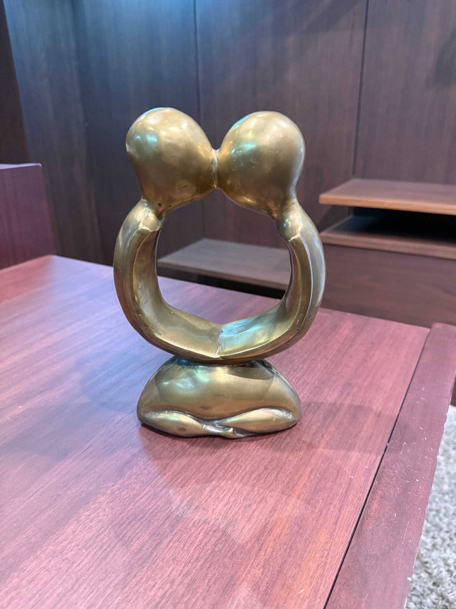 Brass abstract sculpture two figures kissing